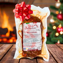 ’Nduja di Spilinga Bellantone 500 g – scharfe kalabrische Streichwurst, vakuumverpackt, festliche Präsentation vor Kamin und Weihnachtsbaum