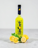 Limmone Limoncello Zitronenlikör in gelber Flasche mit frischen Zitronen und Minze – italienischer Limoncello online kaufen Bella Italia Store