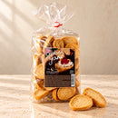 Crostini di Grano Colacchio – Knusprige Weizen-Crostini, 250 g – Produktansicht auf cremefarbenem Travertin