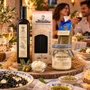 italienische Feinkostpaket „Nero di Seppia“ – Bio Olivenöl, schwarze Spaghetti, Knoblauchcreme & Oregano italienische Feinkostpaket – Italienische Tischatmosphäre mit Gästen