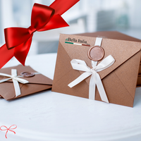 Eleganter Bella Italia Geschenkgutschein in edler Verpackung mit Schleife – das perfekte Geschenk für Feinschmecker und Italienliebhaber